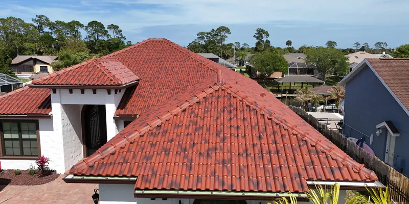 Tecno barrel tile roof in terracotta on a Mediterranean-style home